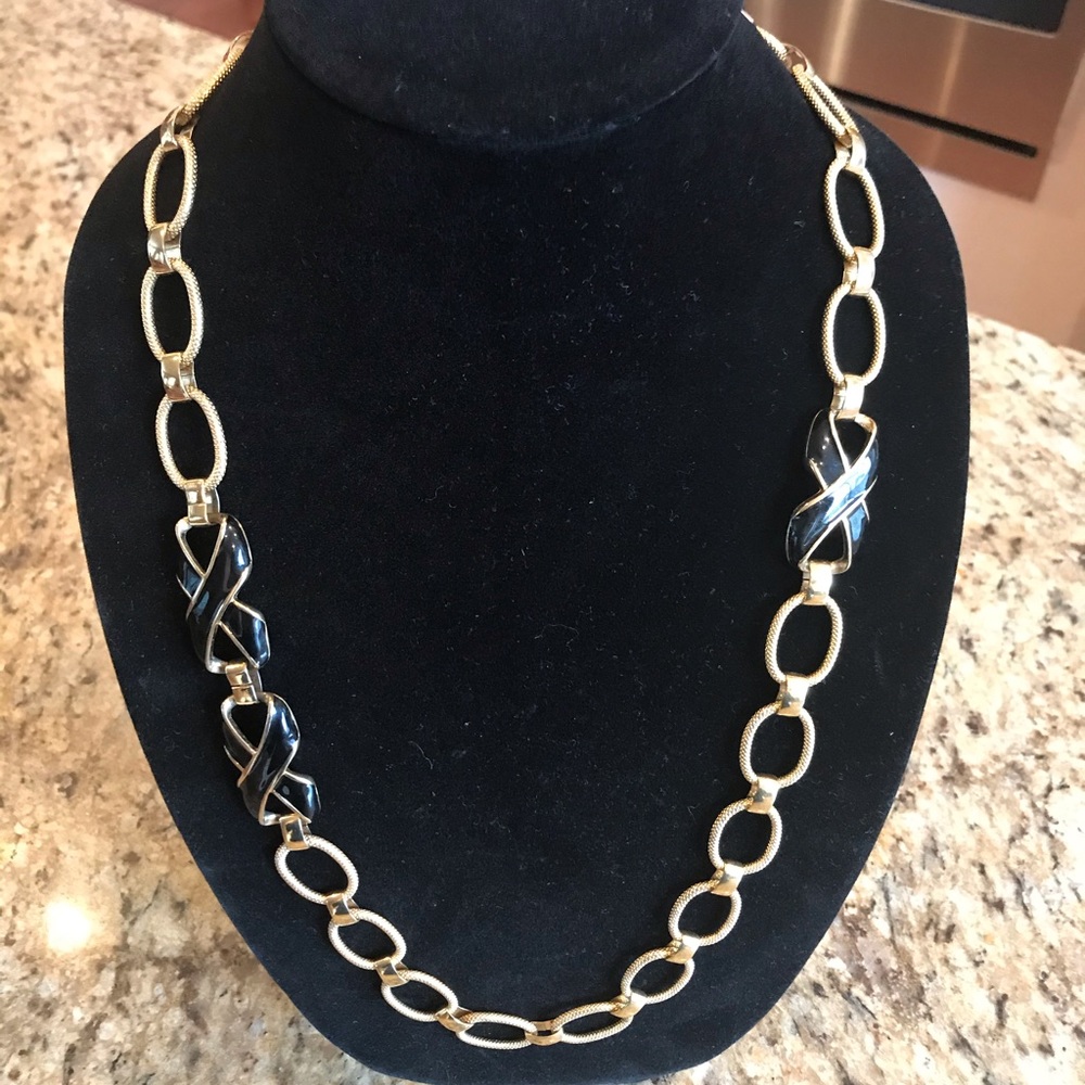 Classic Monet long gold tone X necklace